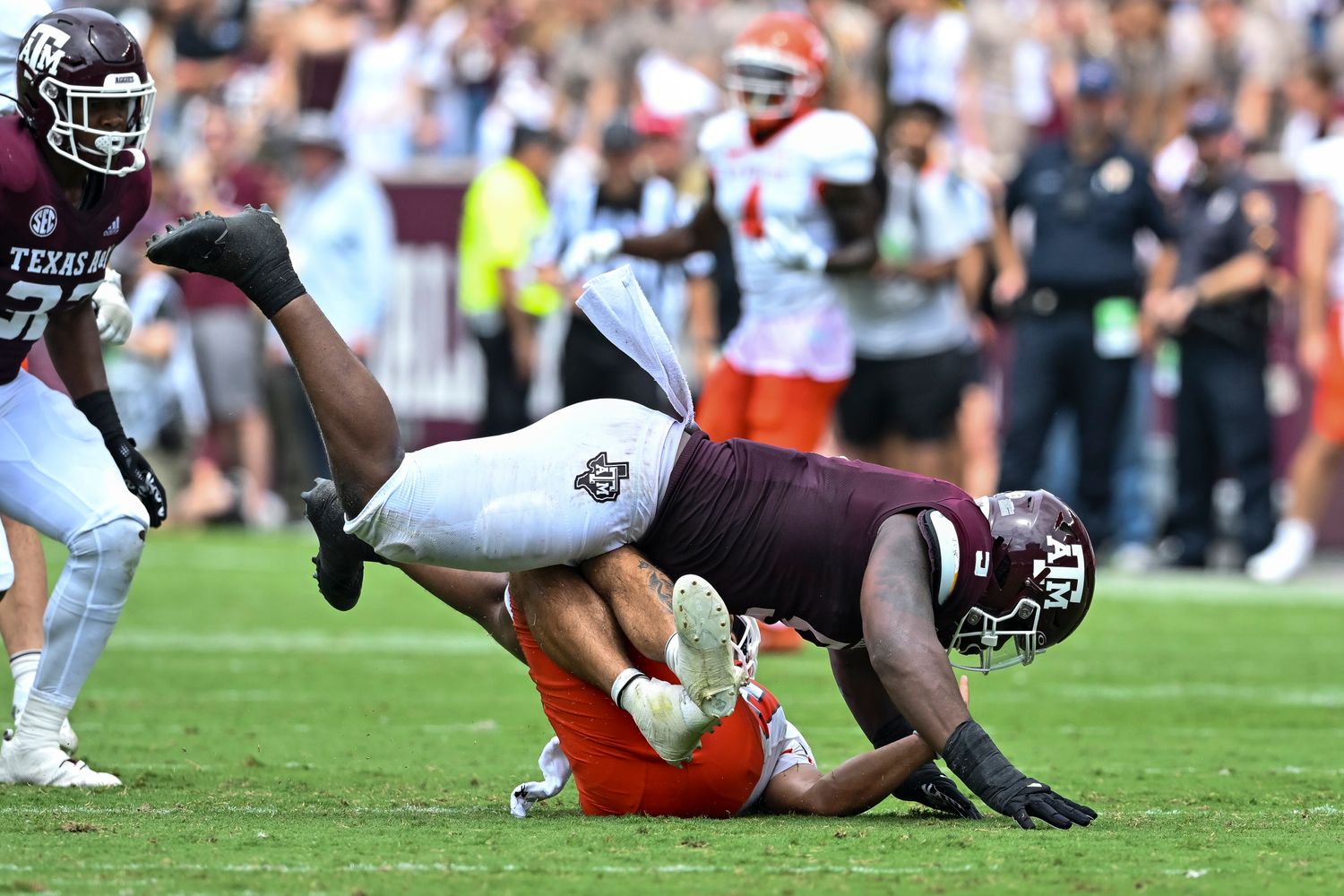 Texas A&M Aggies defensive lineman Shemar Turner (5) sacks Sam Houston State Bearkats quarterback Jordan Yates (13) during the first quarter at Kyle Field.